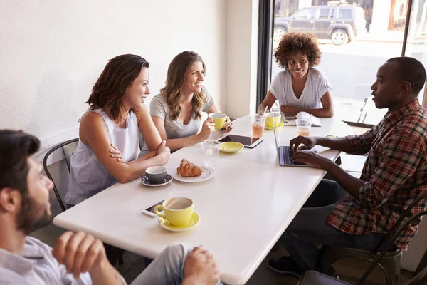 Friends sitting at cafe — Stock Image Friends sitting at cafe Stock Picture