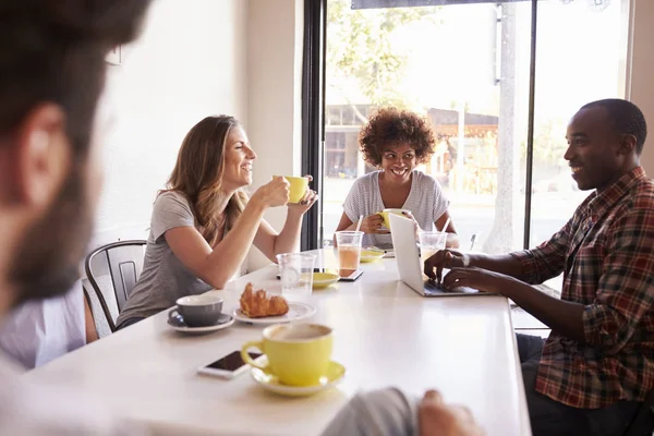 Friends sitting at cafe — Stock Image Friends sitting at cafe Stock Picture