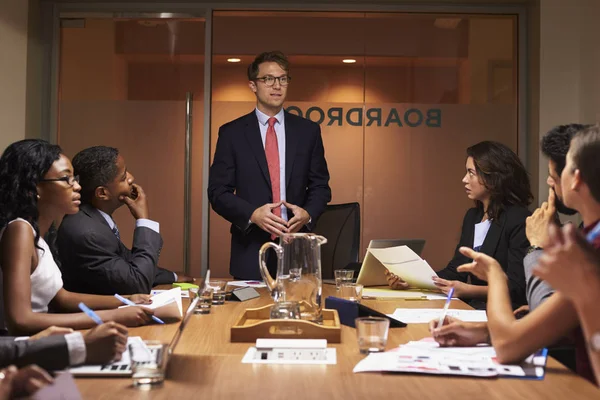 White businessman standing at meeting — Stock Photo, Image