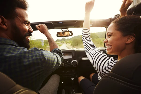 Happy couple driving car — Stock Photo, Image