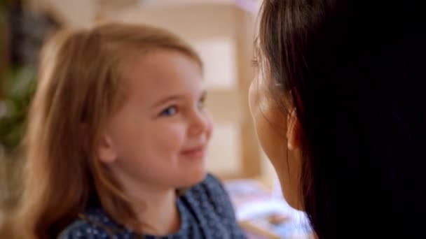 Daughter Sitting On Mother's Lap — Stock Video