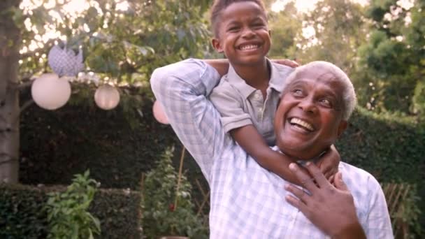 Boy playing with grandad — Stock Video