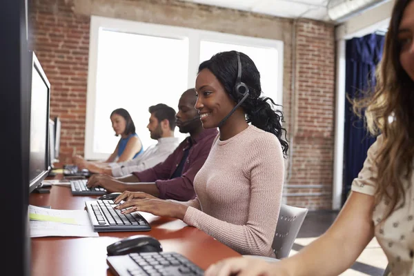 Staff Working In Busy Customer Service Department Shot — Stock Photo, Image