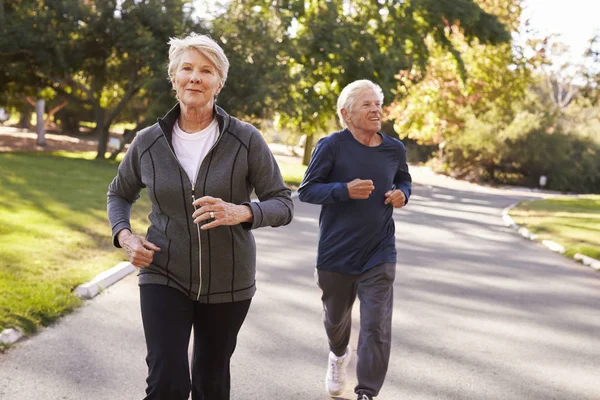 Coppia anziana Jogging — Foto Stock