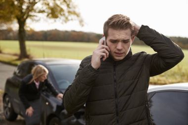 Man Calling To Report Car Accident  clipart