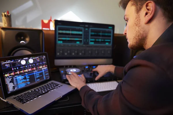 Young Man Composing Music on Laptop Computer in Bedroom — Stock Photo, Image