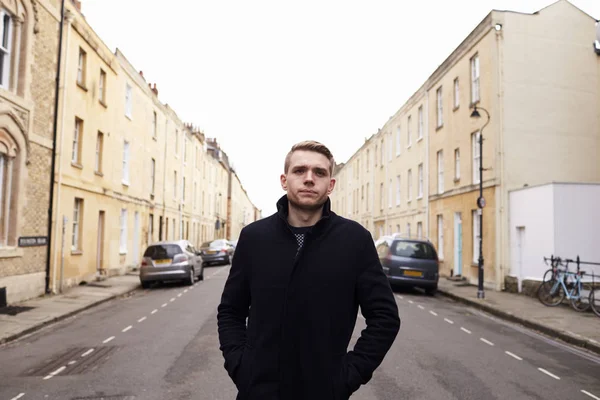 Man Walking Along Residential Street — Stock Photo, Image