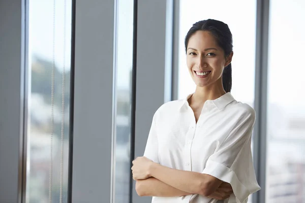 Businesswoman Standing By Window — Stock Photo, Image