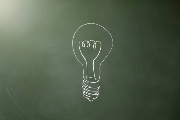 Lightbulb drawn on a chalkboard — Stock Photo, Image