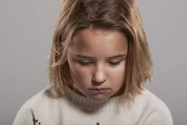 Sad nine year old girl — Stock Photo, Image