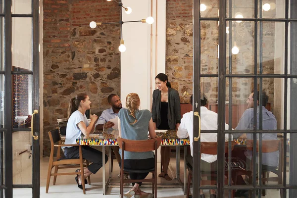 Female boss with business team — Stock Photo, Image