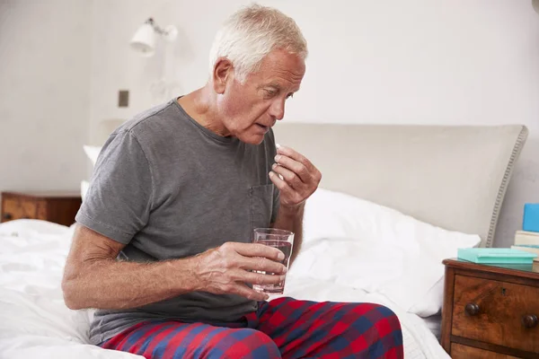 Senior Man Taking Medication — Stock Photo, Image