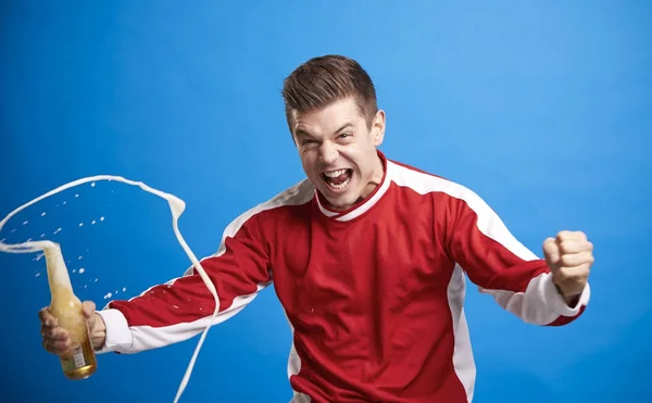 Male sports fan celebrating — Stock Photo, Image