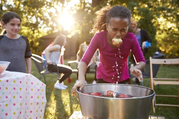 Pre Teen Girl Apple Mouth Apple Bobbing Garden Party — Stock Photo, Image