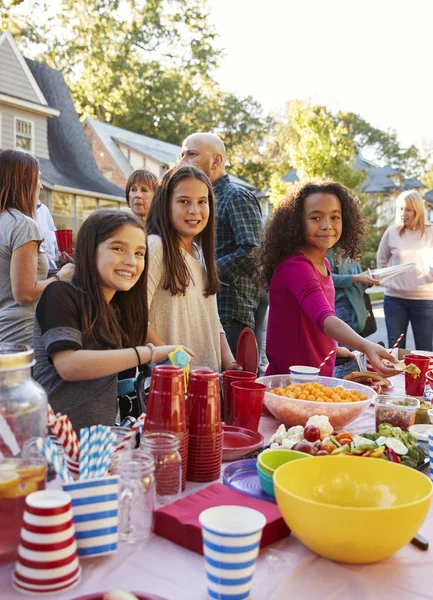 Pre Teen Girls Smiling Camera Block Party Food Table — Stock Photo, Image