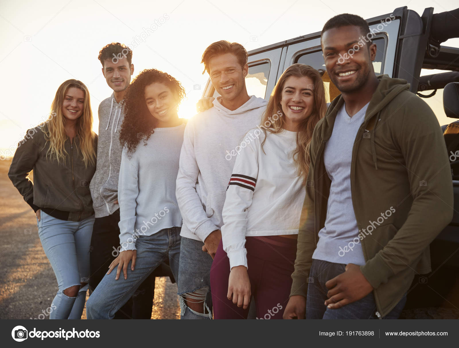 Young Adult Friends Road Trip Standing Jeep Close Stock Editorial Photo C Monkeybusiness