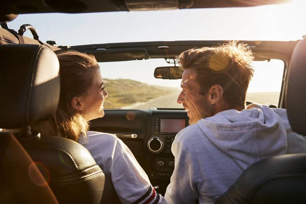 Couple Look Each Other While Driving Rear Passenger Pov — Stock Photo, Image