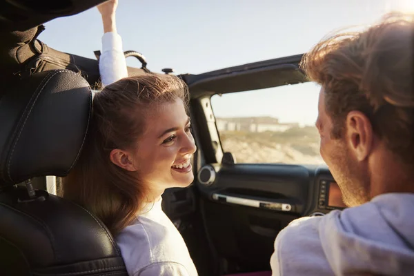 Couple Look Each Other While Driving Rear Passenger Pov — Stock Photo, Image