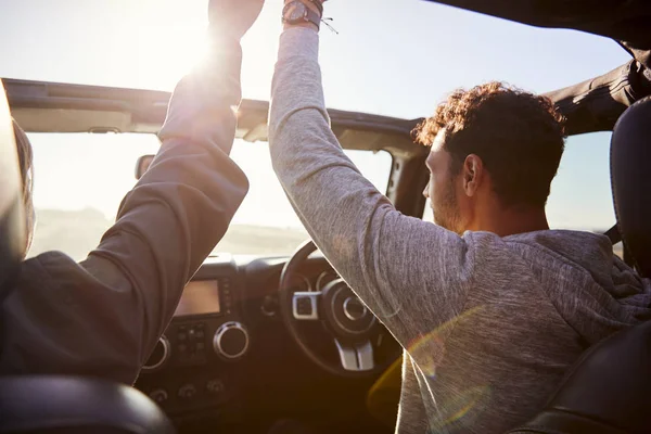 Young Couple Driving Sunroof Open Hands Air — Stock Photo, Image