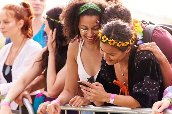 Young Friends Audience Barrier Outdoor Music Festival Looking Mobile Phone — Stock Photo, Image