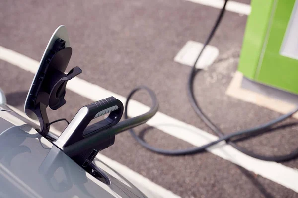 Close Power Cable Charging Electric Car Outdoors Supermarket Car Park — Stock fotografie