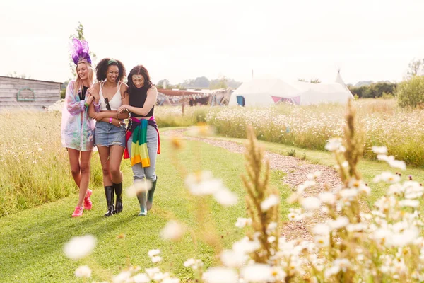 Female Friends Walking Back Tent Outdoor Music Festival — ストック写真