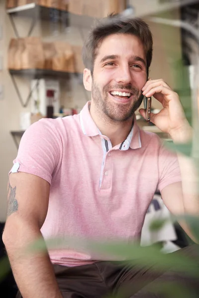 Young Man Coffee Shop Talking Mobile Phone Viewed Window — Stock Photo, Image
