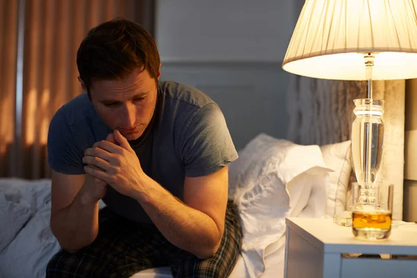 Depressed Man Wearing Pajamas Sitting Side Bed Glass Whisky Bedside — Stock Photo, Image