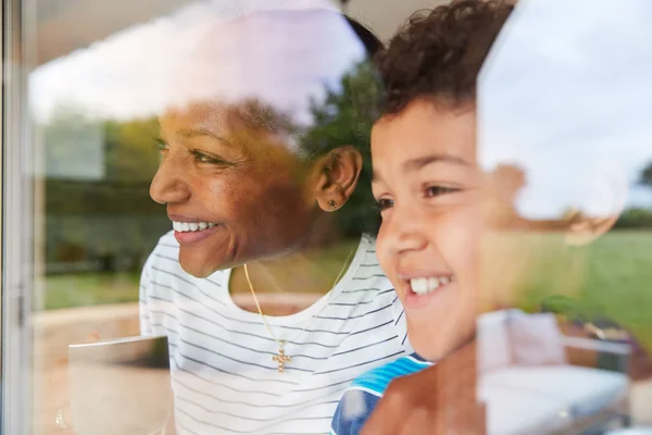 Grandmother Grandson Home Looking Out Window Garden — Stock Photo, Image