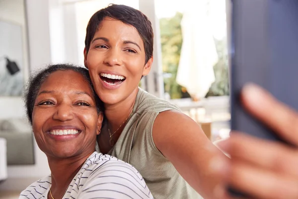 Mother Adult Daughter Taking Selfie Home Together — Stock Photo, Image