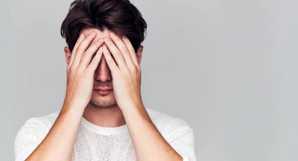 Studio Portrait Ashamed Young Man Covering Face Hands — Stock Photo, Image