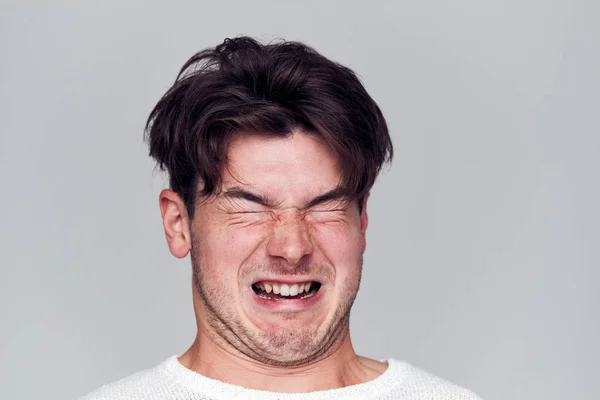 Head Shoulders Studio Shot Man Pulling Faces Smiling Camera — стоковое фото