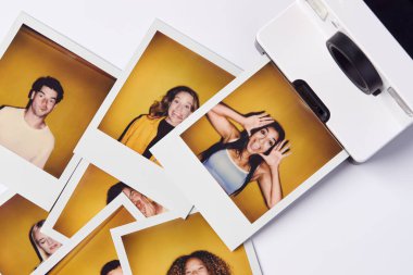 Instant Film Photos Of Young Men And Women For Modeling Casting In Studio On White Background clipart