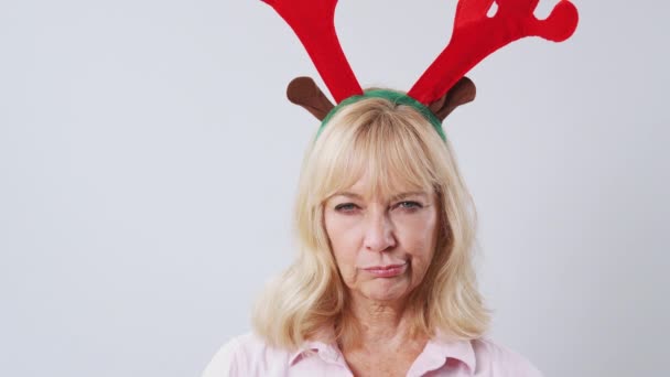 Studio Shot Unhappy Mature Woman Wearing Dressing Reindeer Antlers White — Stock Video
