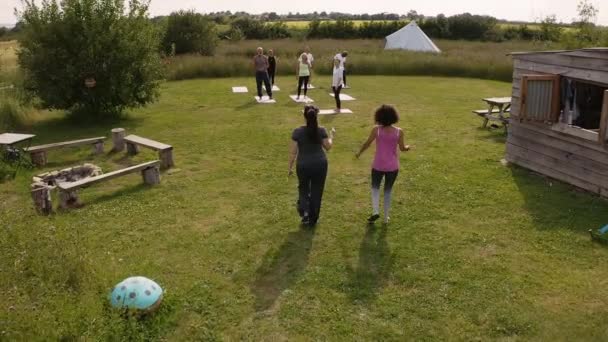 Drone Shot Mature Group Attending Outdoor Yoga Class Countryside Shot — Stock Video