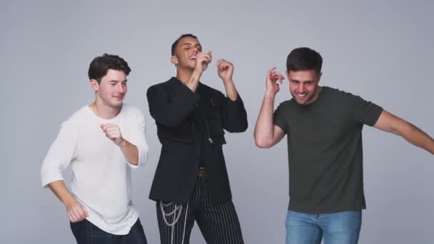 Group Male Friends Studio Laughing Dancing Front White Background Shot — Stockvideo