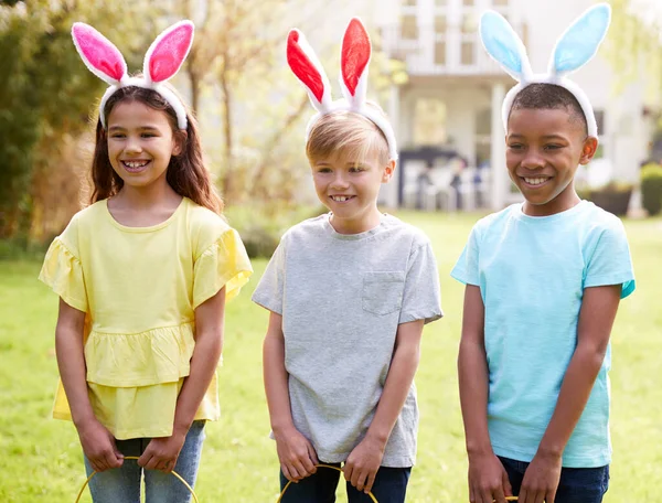 Portrait Three Children Wearing Bunny Ears Easter Egg Hunt Garden — 스톡 사진