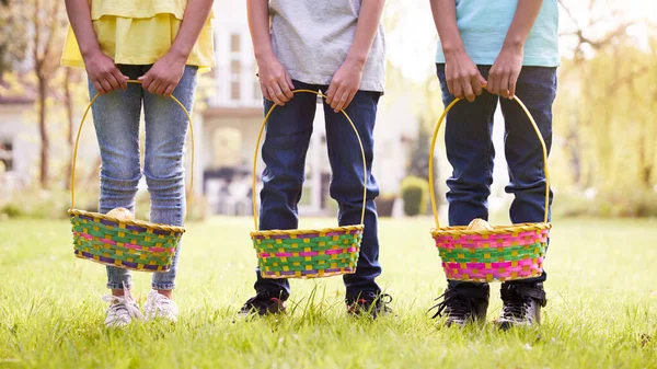 Close Three Children Holding Baskets Easter Egg Hunt Garden — Stock Photo, Image