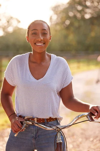 Portrait Young Woman Riding Bike Country Lane Sunset — Stock Photo, Image