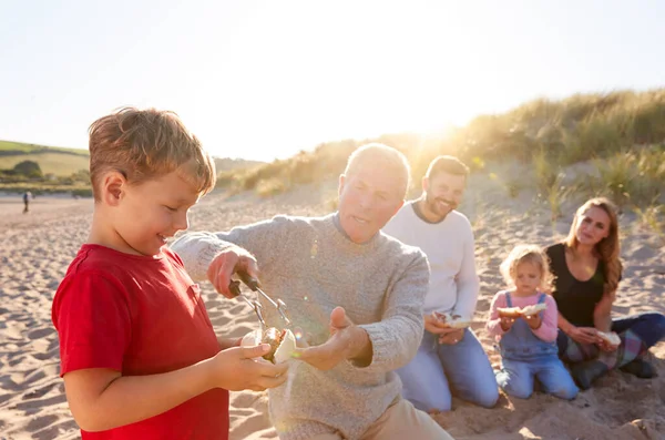 Grandfather Cooking Multi Generation Family Having Evening Barbecue Fire Beach — Stock Photo, Image