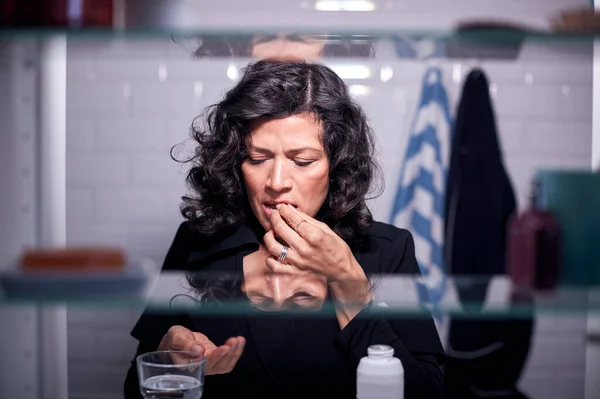 View Bathroom Cabinet Mature Woman Taking Medication Glass Water — Stock Photo, Image