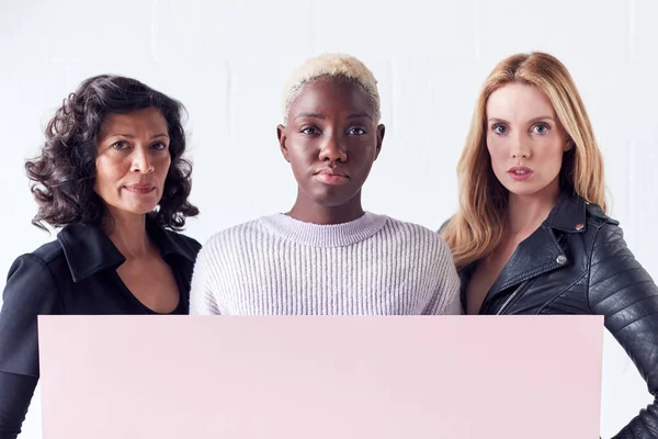 Three Women Holding Blank Pink Card Copy Space Standing White — Stok Foto