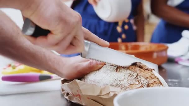 Close Man Slicing Loaf Bread Dish Kitchen Cookery Class Shot — Stock Video