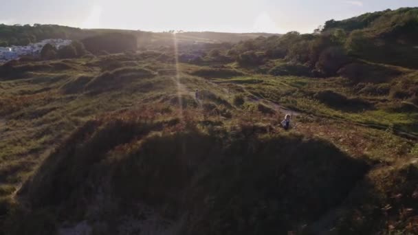 Drone Shot Two Young Girls Having Fun Playing Sand Dunes — Stock Video