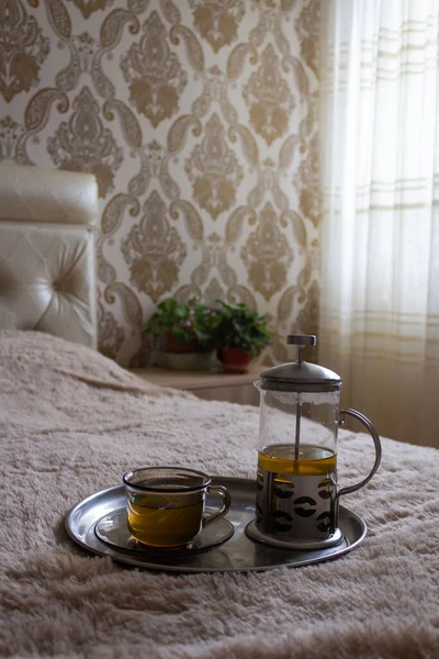 Child Lies Bed Holds His Hands Card Next Tray Cup — Stock Photo, Image