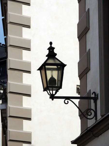 Urban lighting wall lamp metal antiques on a stone building