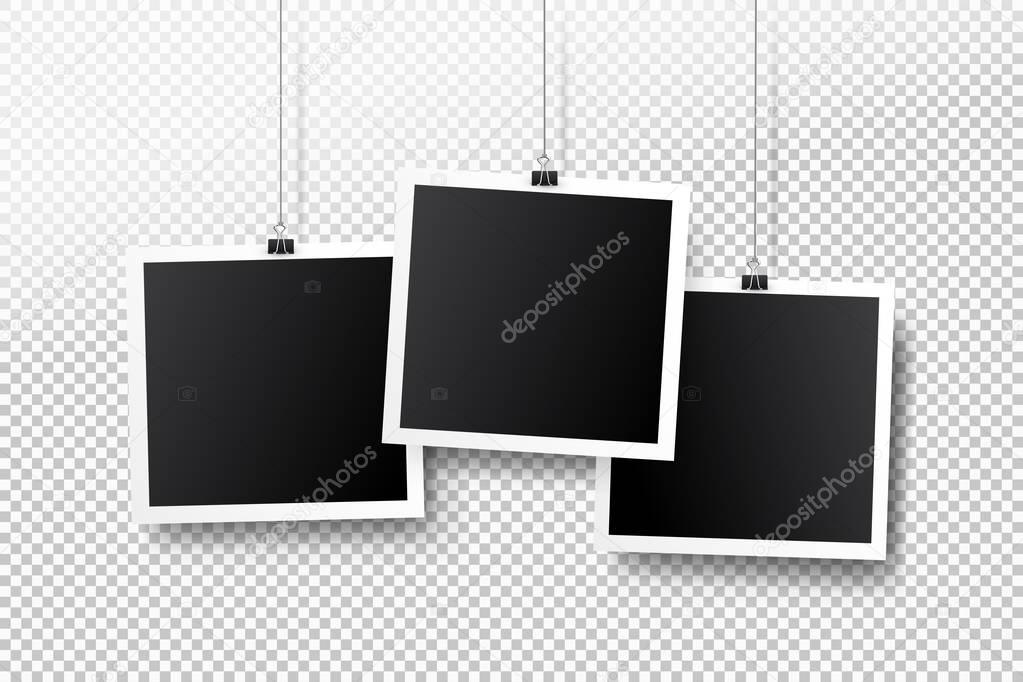 Blank photo frame set hanging on a clip. Retro vintage style. Black empty place for your text or photo. Realistic detailed photo icon design template. Vector illustration. Isolated on transparent background.