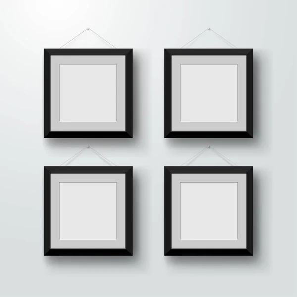 Marcos de fotos en blanco en la pared. Diseño para un interior moderno. Ilustración vectorial. Aislado sobre fondo gris — Archivo Imágenes Vectoriales