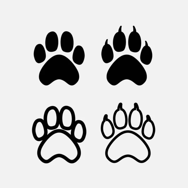Conjunto de silueta de impresión de pata de perro negro. Garra de perro. Ilustración vectorial. Aislado sobre fondo blanco . — Vector de stock