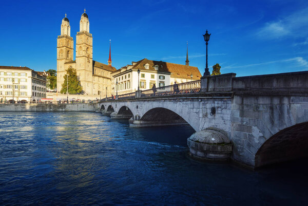 Zurich city center with famous Grossmunster and river Limmat, Sw